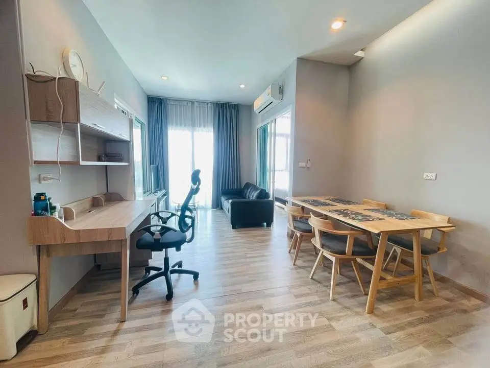 Modern living room with stylish furniture and ample natural light