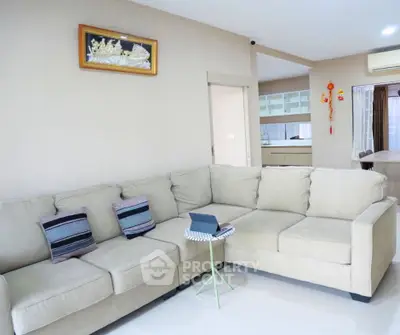 Spacious living room with cozy sectional sofa and modern decor