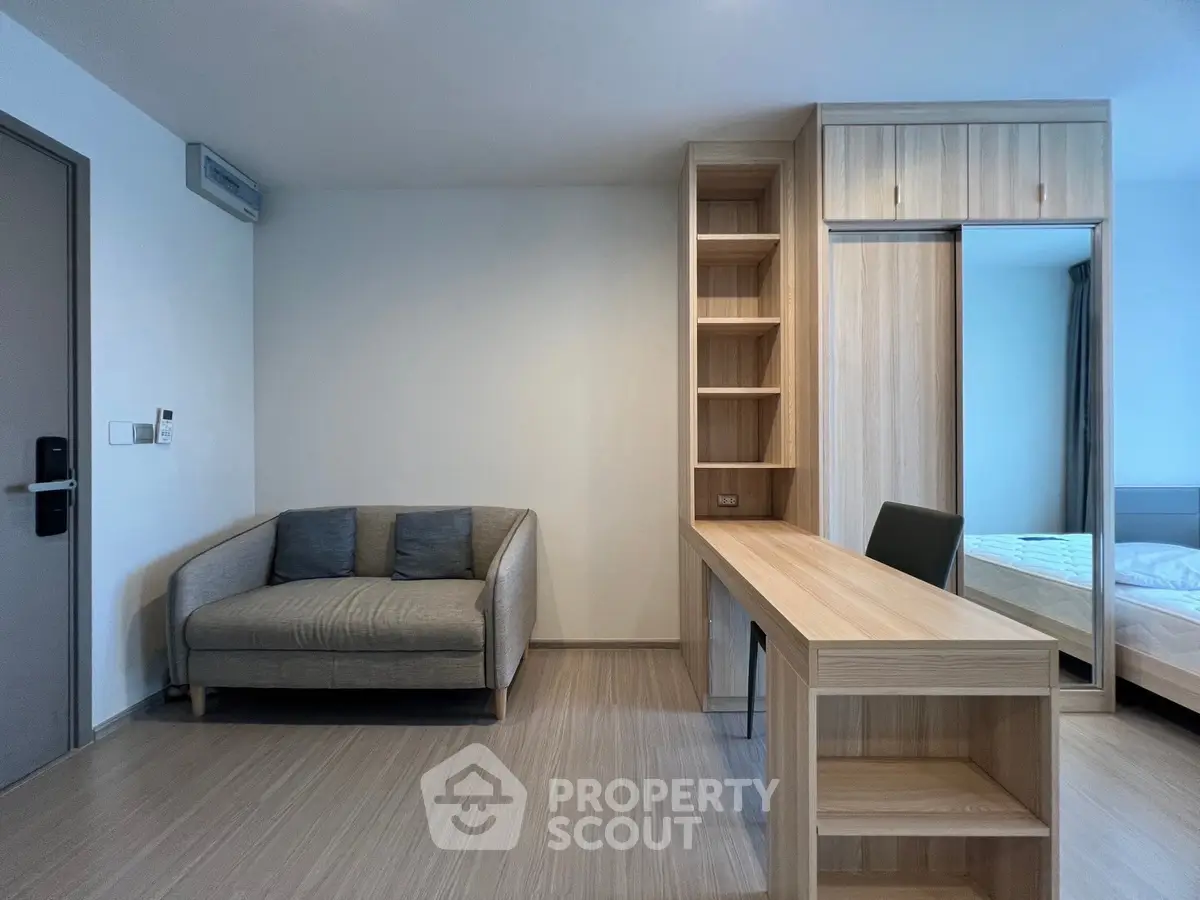 Modern apartment interior with cozy living area and stylish wooden furniture