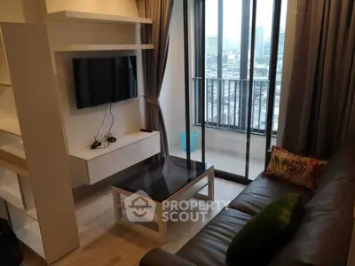Modern living room with balcony view in urban apartment