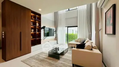 Luxurious modern living room with high ceilings and elegant decor