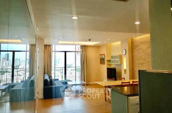 Spacious living room with city view and modern decor