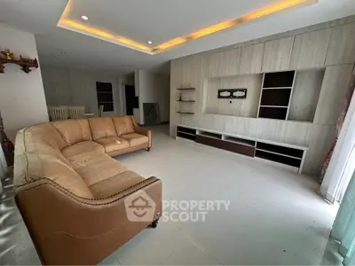 Spacious modern living room with elegant lighting and stylish furniture