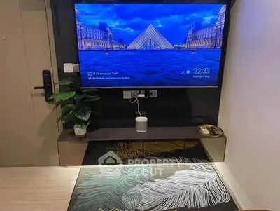 Modern living room with wall-mounted TV and stylish decor