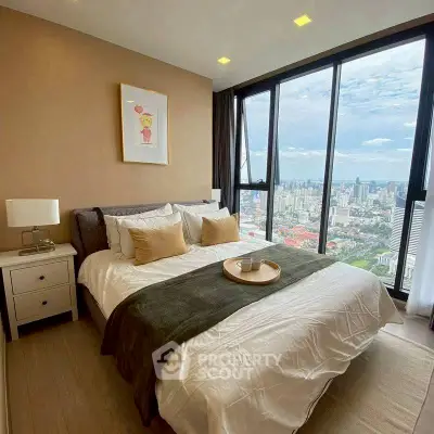 Luxurious bedroom with stunning city view and elegant decor