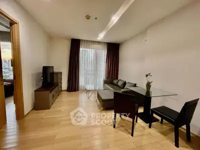 Modern living room with sleek furniture and city view, perfect for urban living.