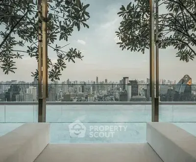 Luxurious rooftop pool with stunning city skyline view, perfect for relaxation and entertainment.