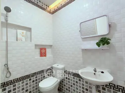 Modern bathroom with stylish tile design and sleek fixtures