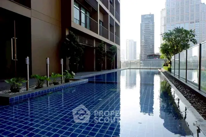 Luxurious urban apartment with stunning pool and city skyline view