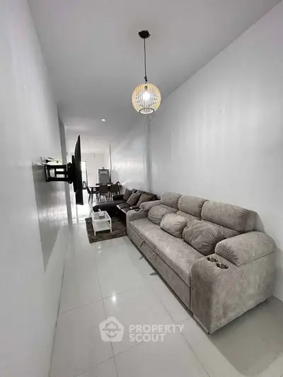 Modern living room with sleek design and comfortable seating