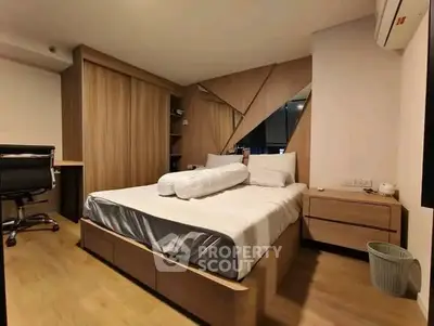 Modern bedroom with stylish wooden accents and cozy ambiance