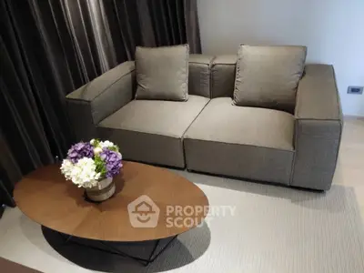Modern living room with stylish sofa and elegant coffee table