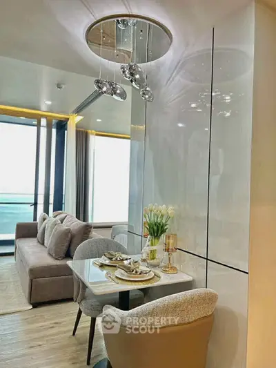 Modern living room with elegant dining area and stylish decor