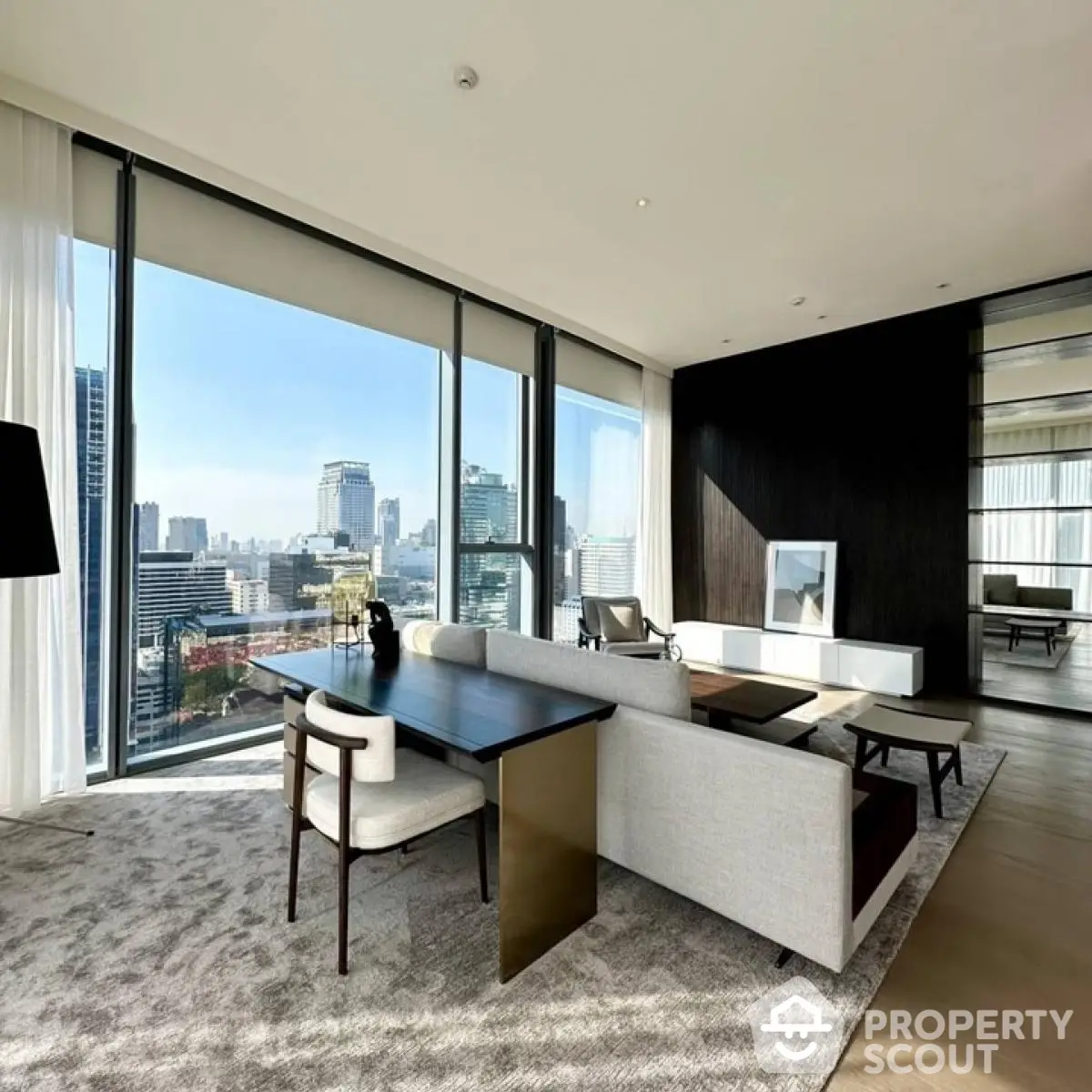 Luxurious modern living room with panoramic city view and elegant furniture