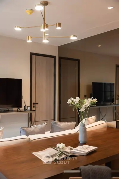 Modern living room with elegant lighting and stylish decor