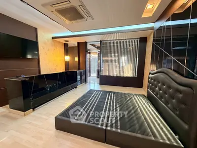 Luxurious modern bedroom with sleek design and ambient lighting