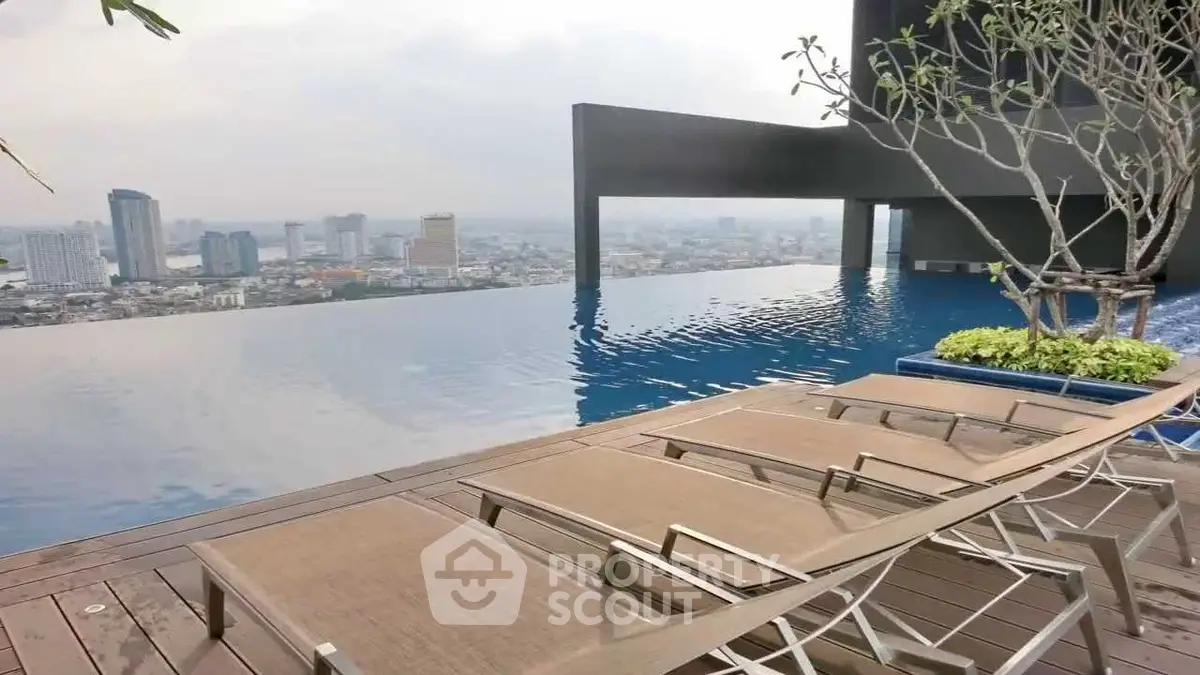 Luxurious rooftop infinity pool with stunning city skyline view