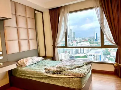 Luxurious bedroom with stunning city view from large window, elegant decor and cozy atmosphere.