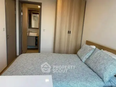 Cozy bedroom with ensuite bathroom and modern decor