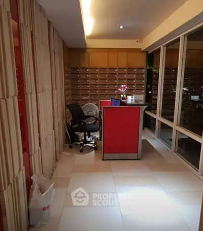 Modern office space with sleek design and large windows for natural light.