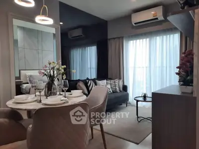Modern open-plan living room with dining area and stylish decor