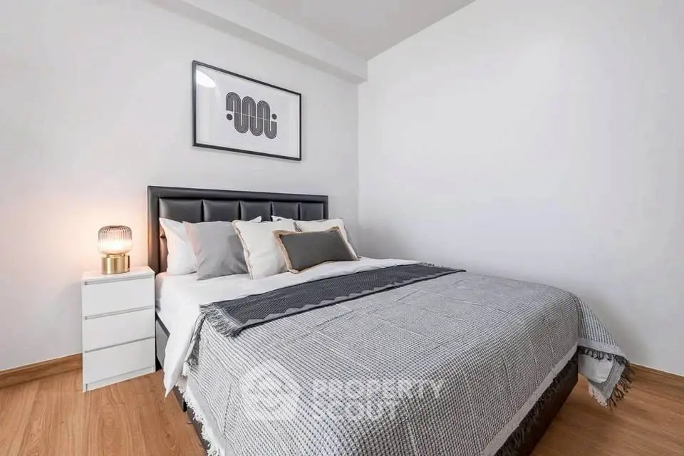 Modern bedroom with stylish decor and cozy ambiance