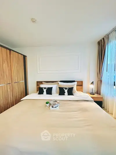 Cozy bedroom with modern decor and natural light