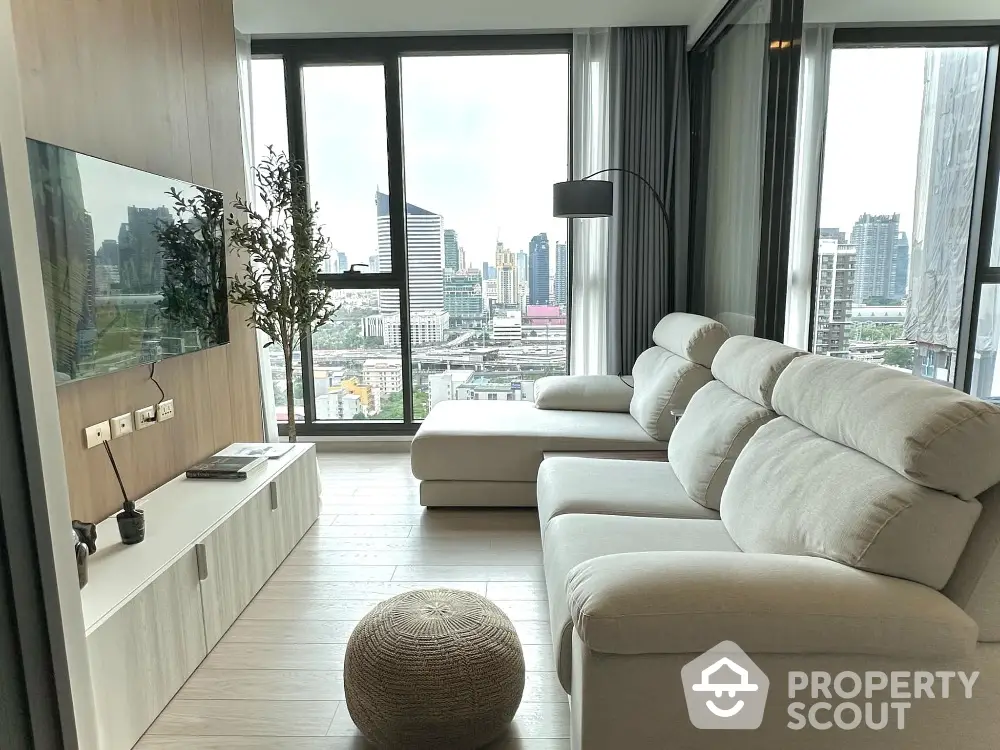 Modern living room with panoramic city view and stylish furniture