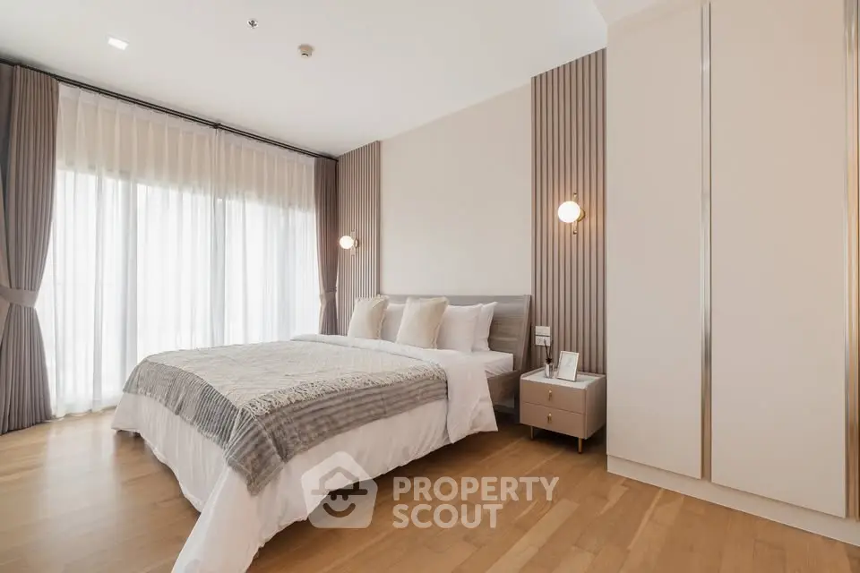 Luxurious bedroom with elegant decor and natural light