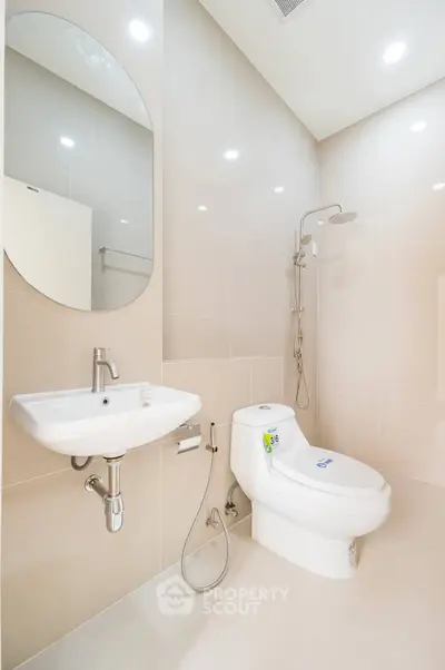 Modern bathroom with sleek fixtures and contemporary design.