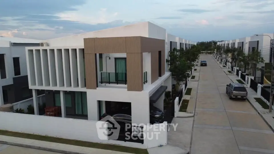 Modern residential neighborhood with contemporary houses and clean streets.