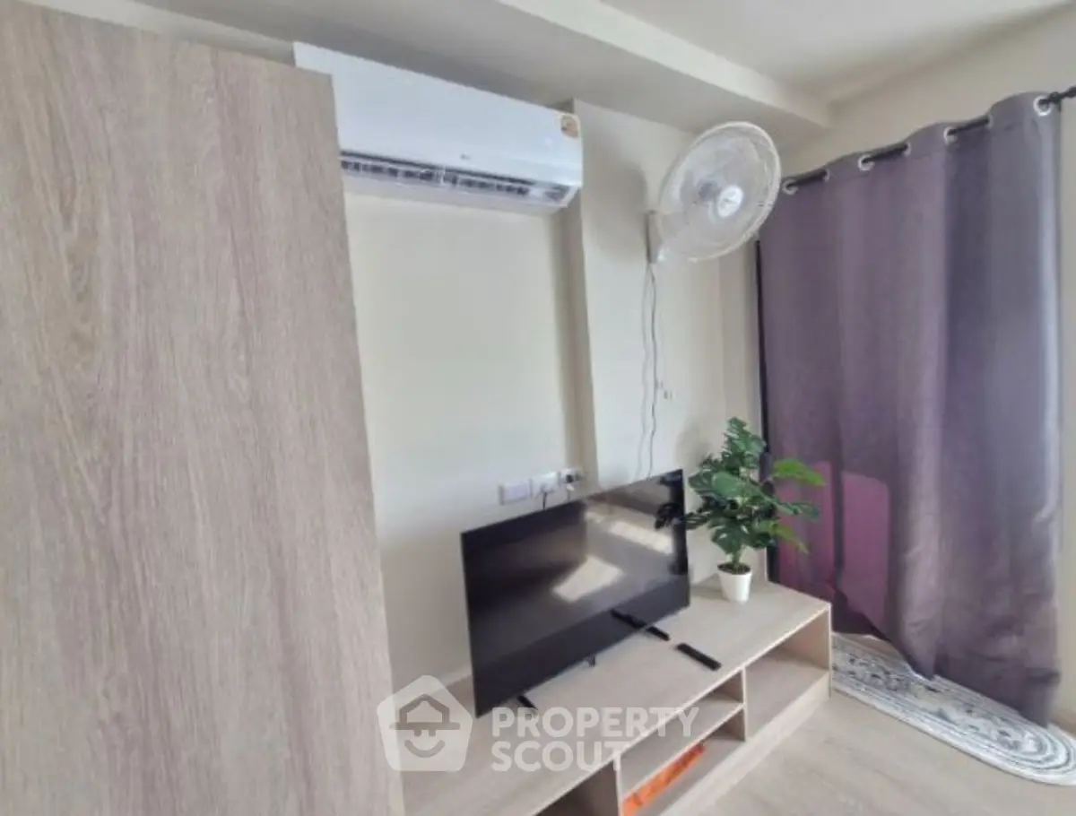 Modern living room with air conditioning and stylish decor