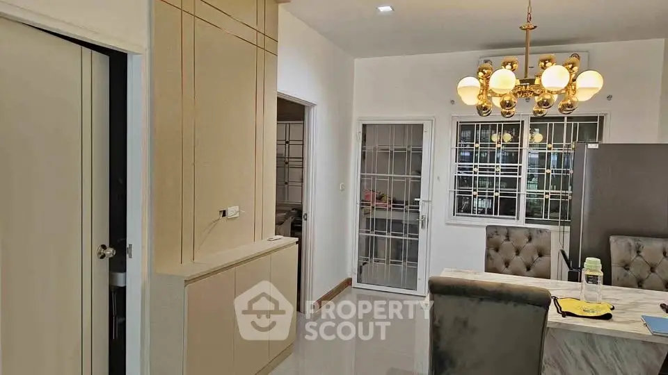 Modern interior with elegant lighting and stylish furniture in a cozy living space.