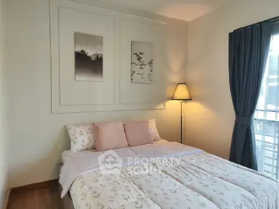 Cozy bedroom with elegant decor and natural light, perfect for relaxation and comfort.