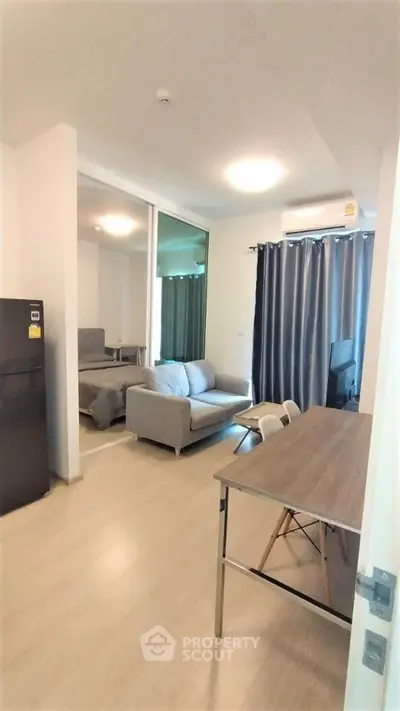 Modern apartment interior with cozy living area and stylish furniture