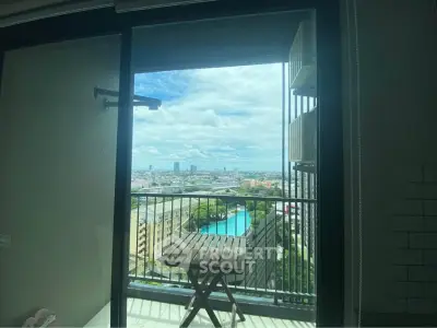 Stunning high-rise balcony view with cityscape and pool, perfect for urban living.