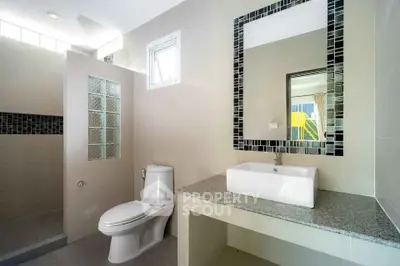 Modern bathroom with sleek design and stylish fixtures