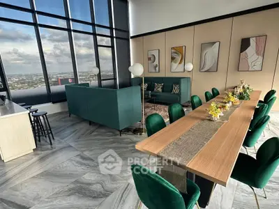Luxurious high-rise living room with panoramic city views and elegant decor