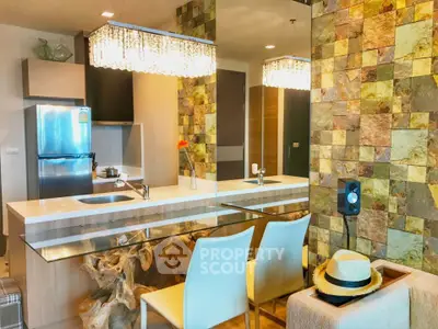 Modern kitchen with stylish lighting and unique wood accents