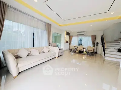 Spacious modern living room with elegant decor and natural light