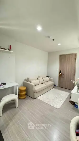 Cozy modern living room with neutral tones and stylish decor