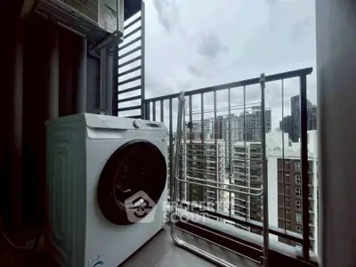 Modern balcony with washing machine and city view, perfect for urban living.