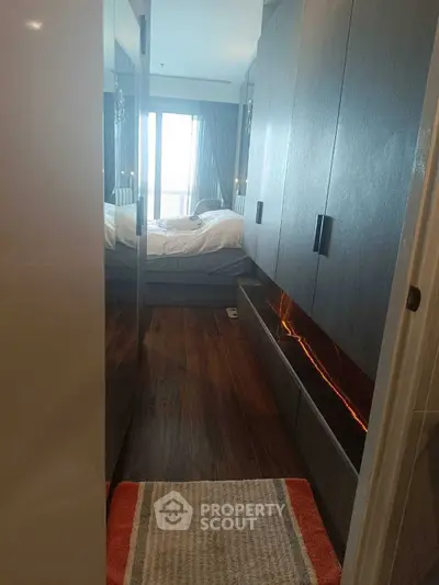 Luxurious bedroom with modern design and elegant wooden flooring