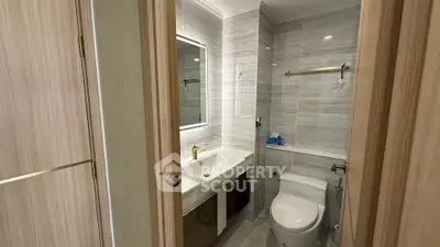 Modern bathroom with sleek fixtures and elegant tile design