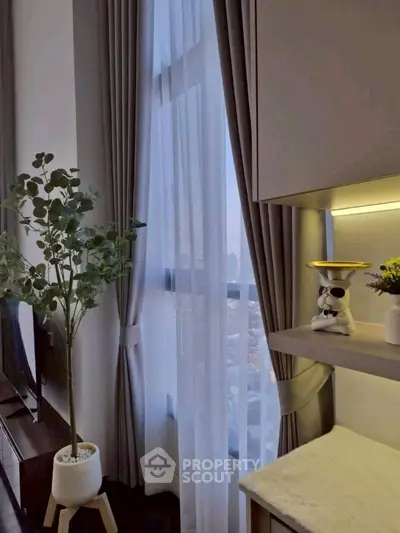 Stylish modern living room with tall windows and elegant decor