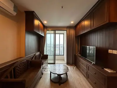 Spacious living room with wooden furniture and balcony view in modern apartment