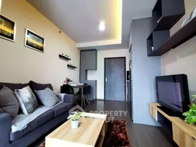 Modern living room with stylish decor and cozy seating area in a contemporary apartment.