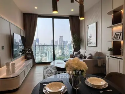 Luxurious living room with stunning city view, modern decor, and elegant dining setup in high-rise apartment.