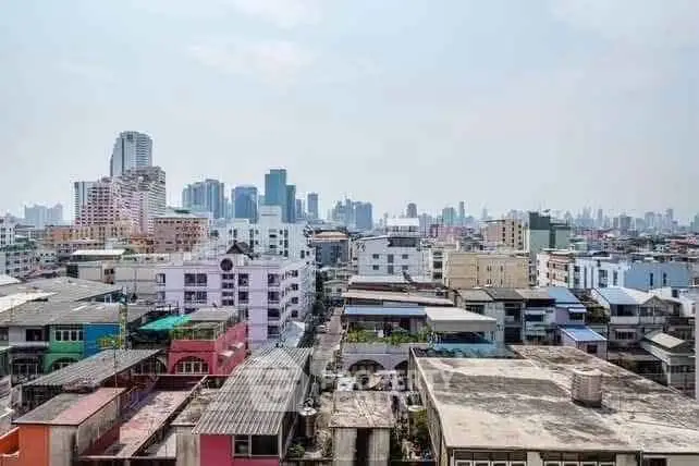 Panoramic cityscape view showcasing diverse urban architecture and skyline.