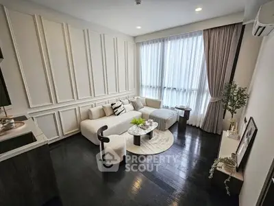 Elegant living room with modern decor and natural light